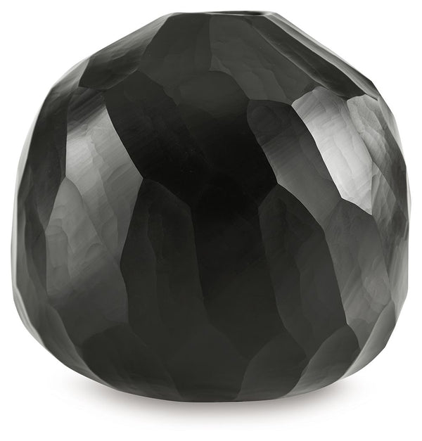 Put the accent on contemporary style with this vase. Wowing with multiple hand-carved facets, the cool black glass delivers true textural appeal from every angle. Itâ€™ll bring an artful touch wherever you see fit.<br/><br/><b>Product Features</b><ul><li>