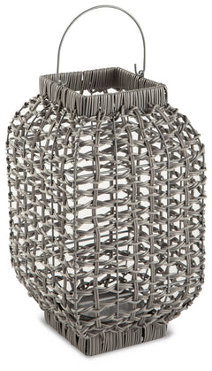 Complete the look of your restful retreat with this homey lantern. Its antiqued gray faux rattan filters the light of your candle (not included) to give a gentle glow to your space. When not in use, this chic indoor/outdoor piece rounds out your decor wit