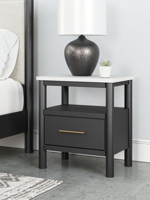  its replicated marble top beautifully contrasts a matte black finish. The chic and convenient bedside companion offers ambient lighting