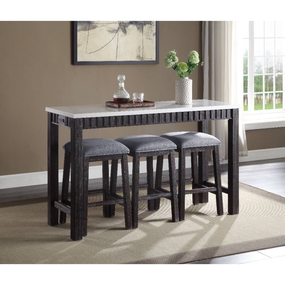 Simple, smart, and stylish, the Necalli counter height set is the perfect solution for small spaces. The compact rectangular table has a smooth marble top that stands out in lovely contrast with the weathered espresso finish of the wooden sled base. A sub