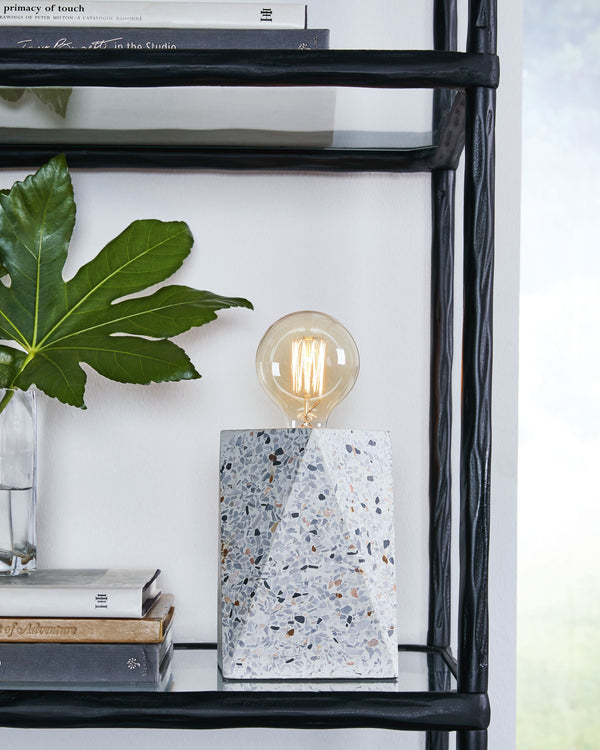  this table lamp offers a practical way to bring contemporary style to your home. Playful speckles in natural tones add an intriguing element to any desk