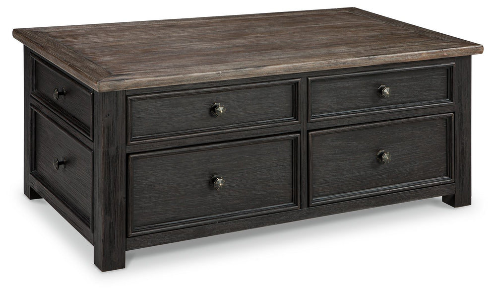 Shabby chic with a hint of down-home country, this lift-top coffee table is all the talk of todayâ€™s design world. Wood grain shows through the weathered gray-brown top in all of its earthy pleasure. The framed drawers, adorned with lovely traditional ha