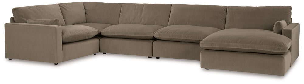 Find yourself inspired by elevated yet functional style. This sectional with chaise balances ultra-soft seating with a clean-cut appearance. Its modular design caters to your needs, whether youâ€™re making space for guests or setting up a cozy family movi