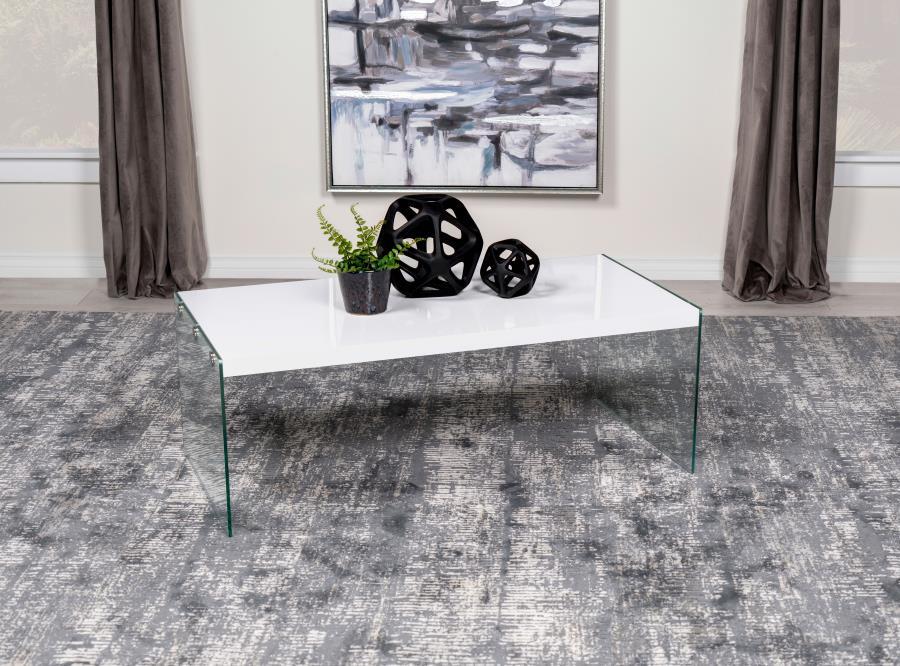 Elevate your living room with this ultra-modern rectangular coffee table, designed to blend sleek aesthetics with functionality. The engineered wood top showcases a white high-gloss finish, delivering a clean, contemporary vibe. Clear tempered glass side 