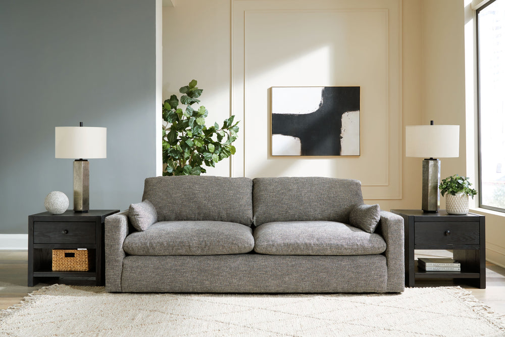 On the days when rest and relaxation seem out of reach, this sofa & loveseat provides a positively plush seating experience. Its feather-fiber blend cushions invite you to float away in cloud-like comfort. Striking granite-hued upholstery and a streamline