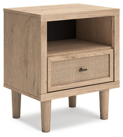 Clean-lined and contemporaryâ€”but far from starkâ€”this nightstand is a fresh style awakening. Pairing a light finish with replicated oak grain and textured beige details that replicate the look of cane, its mixed materials bring a naturally versatile vi