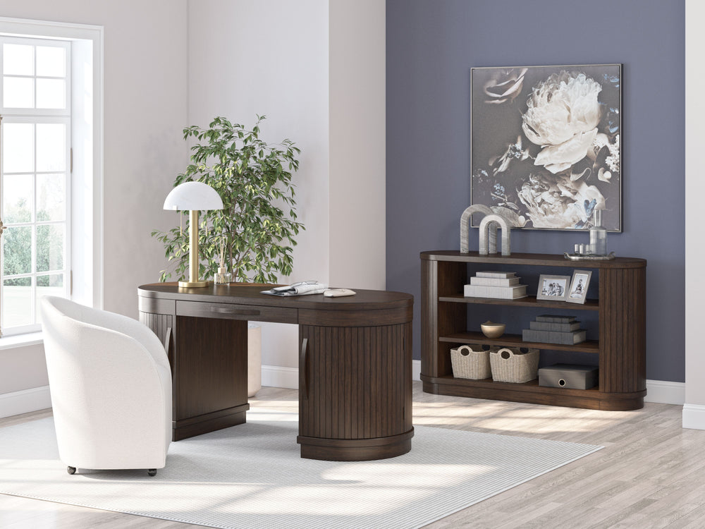 Casual contemporary design. Made with hardwood solids and veneers with MDF substrate. Finished in a rich warm brown wood tone that enhances the wood grain character. Executive style desk with an upscale design. Desk features 2 half round door cabinets wit