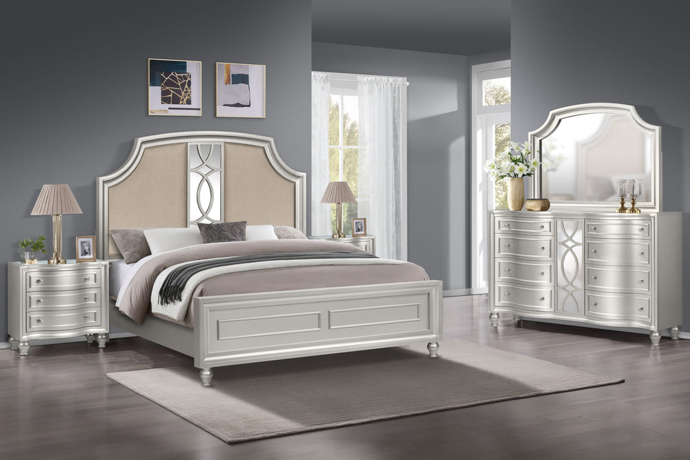 Discover the Reflection 5 Piece Bedroom Set in Silver, featuring a captivating bed, dresser, mirror, and two nightstands. Crafted with solid Pine and manufactured wood, this collection ensures enduring strength and durability. The glamorous matte silver f