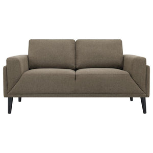  its streamlined silhouette is highlighted by meticulous topstitch details and track arms complemented by mitered front accents. Prio