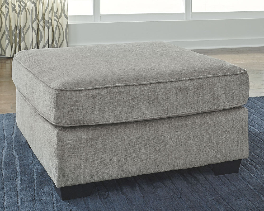 If style is the question, then this oversized accent ottoman is the answer. Its clean-lined profile is beautifully contemporary. The plush chenille fabric and plump cushioning make it so easy to comfortably kick up your heels. And the ottomanâ€™s richly n