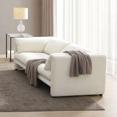 Create a serene and stylish living space with this elegant Jaeda sofa upholstered in beige linen. Its soft tones blend seamlessly with any decor, while the plush cushions provide exceptional comfort. Perfect for both casual lounging and sophisticated gath