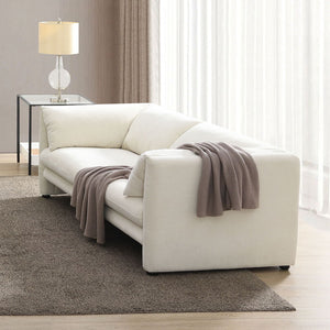 Create a serene and stylish living space with this elegant Jaeda sofa upholstered in beige linen. Its soft tones blend seamlessly with any decor, while the plush cushions provide exceptional comfort. Perfect for both casual lounging and sophisticated gath