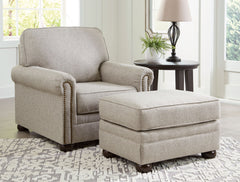 Inspired by the past but rooted firmly in the present, this living room set complements your transitional seating area. Its versatile upholstery is delightfully detailed for a subtle herringbone effect. Designer touches like decorative nailhead trim and b