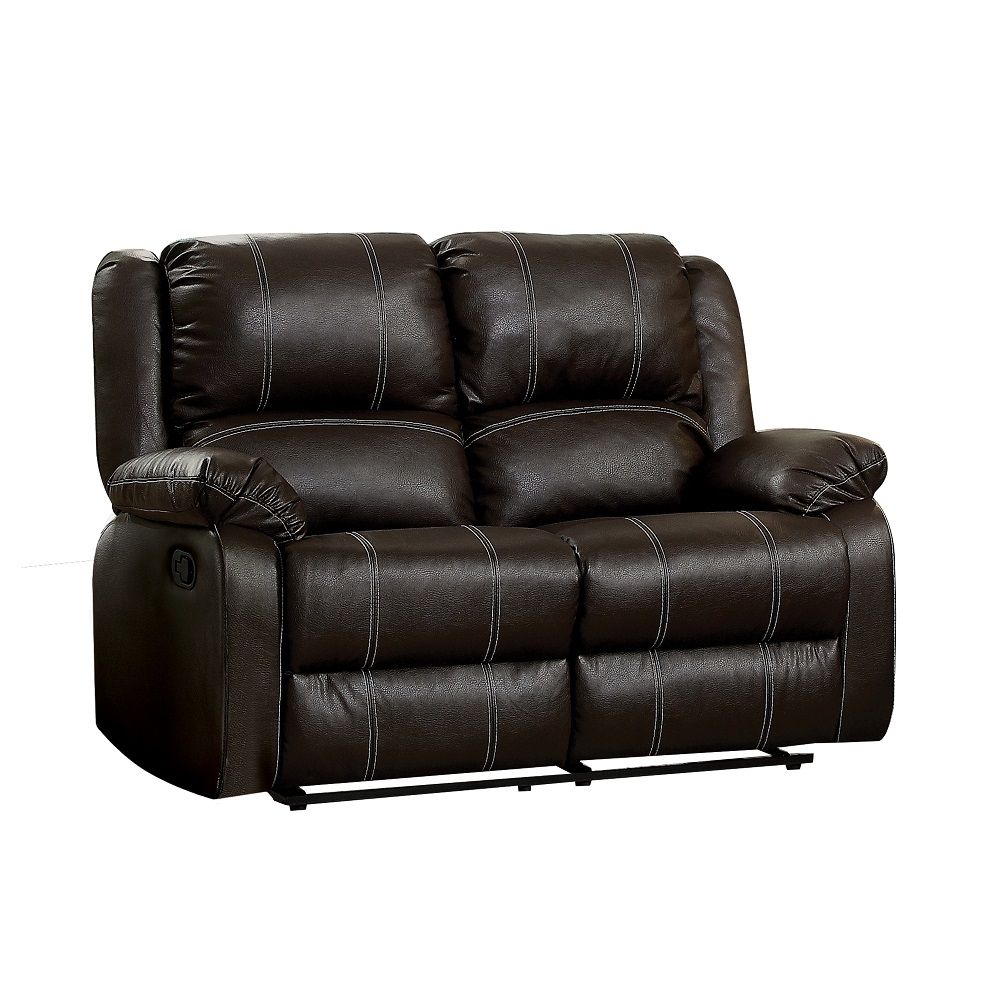 The Zuriel reclining sofa collection is a wonderful choice for any family room, combines luxurious faux leather with the comfort of padded, reclining seating. Comfortable contoured seats, soft to the touch while the reclining footrests offer full leg supp
