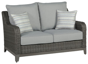 Add a distinguished touch of gray to your outdoor living space with this loveseat. It-'s made with resin wicker over an aluminum frame for a relaxed look that provides seasons of enjoyment. Rest assured