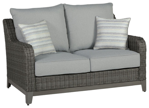Add a distinguished touch of gray to your outdoor living space with this loveseat. It-'s made with resin wicker over an aluminum frame for a relaxed look that provides seasons of enjoyment. Rest assured