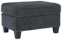 If youâ€™re looking for a smokinâ€™ hot look priced to entice, youâ€™re sure to find this ottoman beautifully fits the bill. Covered in a smoke gray chenille upholstery loaded with plush texture, this less-is-more contemporary ottoman is one sensational s
