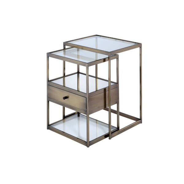Create double the end table space with the contemporary Enca two-piece nesting tables. This trendy antique brass with clear glass set can be used next to each other in a stepped pattern to produce a beautiful showcase or used separately in different areas
