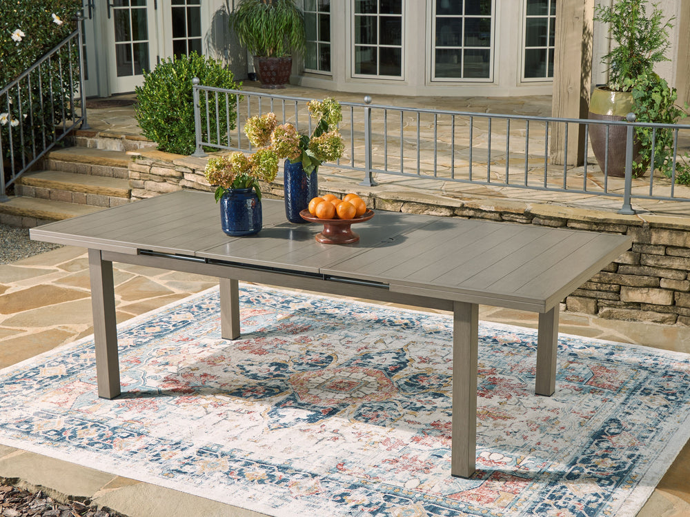 Balancing effortless natural beauty and minimalist design, this dining table seamlessly brings your contemporary style outdoors. Sporting a wood-look finish, it entices with an extension feature that easily expands the table to provide additional space. T