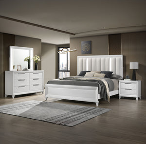 This bedroom set is the epitome of modern elegance, designed for those who desire a sleek and sophisticated sleeping environment. The crisp white finish of the furniture brings a refreshing vibrancy to the room, making it feel both spacious and inviting. 