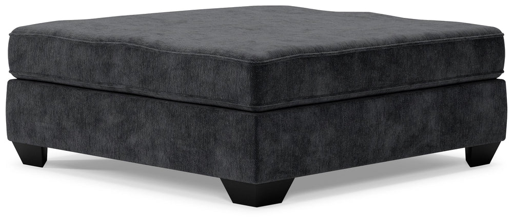 Make room for big-time comfort and style with this oversized accent ottoman. Designed to multitask as a footrest and casually cool coffee table, the firmly cushioned square ottoman is covered in a decadently soft, plush microfiber thatâ€™s love at first t