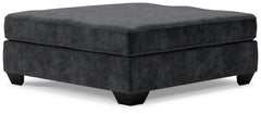 Make room for big-time comfort and style with this oversized accent ottoman. Designed to multitask as a footrest and casually cool coffee table, the firmly cushioned square ottoman is covered in a decadently soft, plush microfiber thatâ€™s love at first t