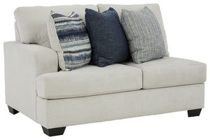 This left-arm facing loveseat is made with polyester upholstery. Pairs with other items in the series to make a sectional.<br><br><b>Additional Dimensions</b><br><ul><li>Arm height: 26-"</li><li>Seat depth: 21-"</li><li>Seat height: 21-"</li><li>Top of cu