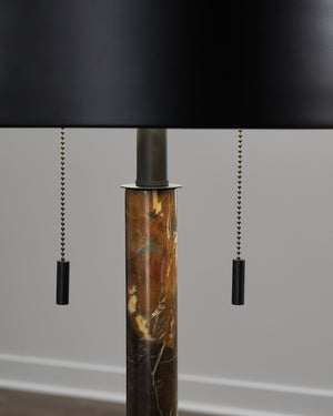  and topped with a metal shade