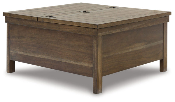 This lift-top coffee table might appear simple at first sight. But a closer look reveals beauty in the details. With a plank-effect tabletop, a tobacco brown finish and antiqued bronze-tone hardware, itâ€™s simply beaming with charm. A handy lift top make