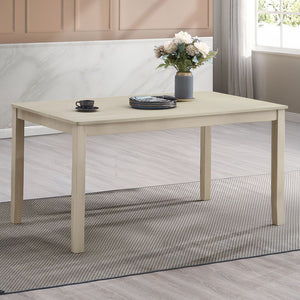 Ferris dining table boasts an antique gray finish exuding timeless elegance. The set includes chairs with intricately designed backs and padded seat cushions, ensuring comfort and style for your dining experience. Perfect for both casual meals and formal 