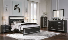 Rest easy. The luxurious look youâ€™ve been dreaming of is yours for the taking, at a price sure to put you at ease. This upholstered panel bedroom group brings a sense of old Hollywood with a contemporary flair. A deep, dark finish, faceted chrome-tone a