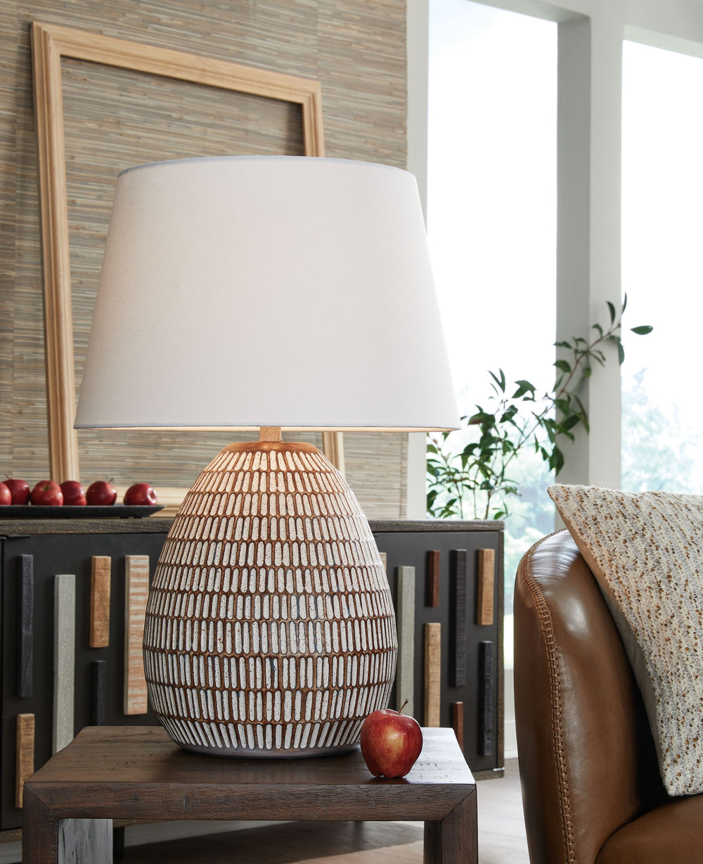 Shine a casual light on your good taste with this table lamp. A distressed beige and white finish on its metal base adds a laid-back simplicity to your existing decor. What an illuminating way to spruce up your space.<br><br><b>Additional Dimensions</b><b