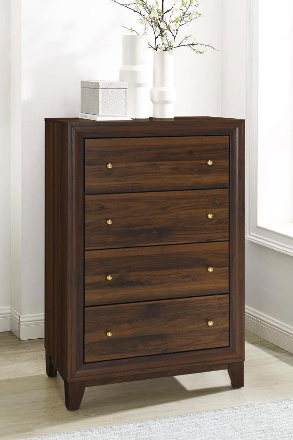 Put finishing touches on your bedroom storage ensemble with this modern five-drawer chest. It offers a refined look and feel with its walnut wood grain finish and contrasting warm gold finish round knobs. The chest is made from durable engineered wood and