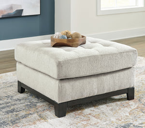  on-trend style meets functionality in this oversized accent ottoman. Details like a tufted top cushion and wrap-around accent base reflect your urban contemporary tastes while staying versatile as your style changes. And with its soft upholstery