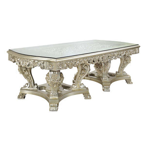 Opulent and magnificent the Sornia dining table will be the focal point of any dining room and is sure to wow guests. The clear glass tabletop allows for the fine details to be enjoyed while dining and will be the topic of conversation throughout the nigh