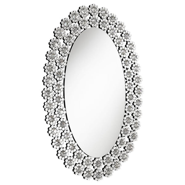 Radiate elegance with this striking oval wall mirror adorned in dazzling faux crystal blossoms. A stunning blend of modern glamour and floral charm, it brightens up any room with its reflective surface and sparkling frame. Perfect for entryways, bathrooms