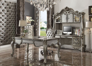The Versailles office set was inspired by old European design. This collection features carved scrollwork accent with hand-brushed finish. The accent pieces crafted in wood with antique platinum finish and also included regal features such as ample storag