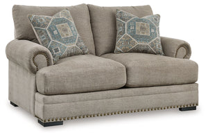Looking to enhance your home-'s visual appeal? This loveseat offers sophisticated design, comfort and elegance with tonal colors, roll arms and nailhead accents. Enjoy optimal coziness as you nestle into luxurious soft upholstery and feather-blend cushion