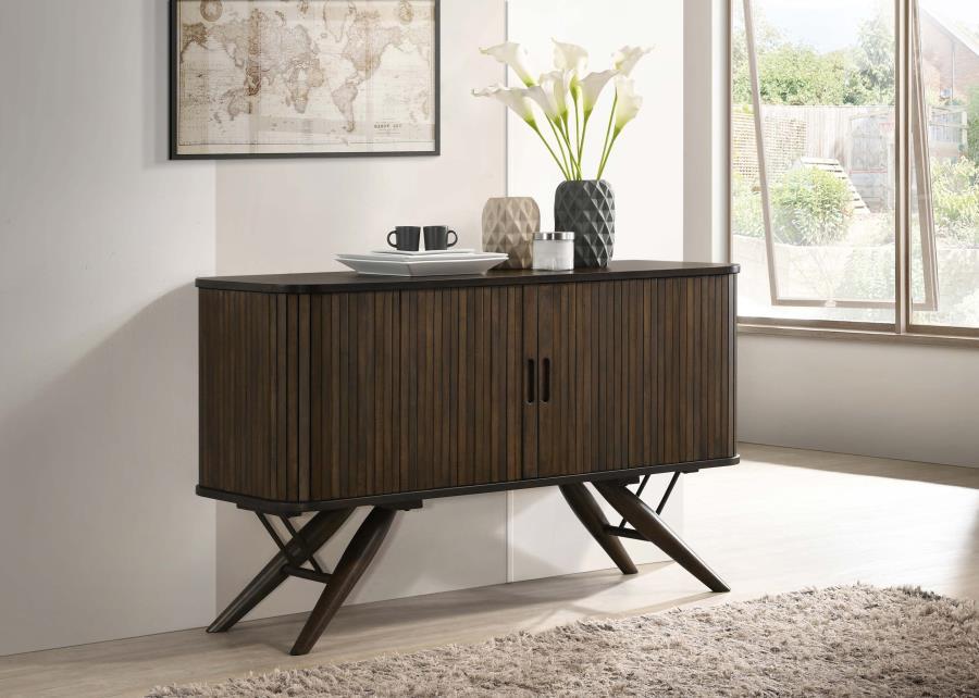 Elevate your dining area with this mid-century modern server. Beautifully designed with campaign style influences, this contemporary server rests on striking flared legs that offer a retro-inspired aesthetic. Tambour doors with finger-tip pulls bring out 