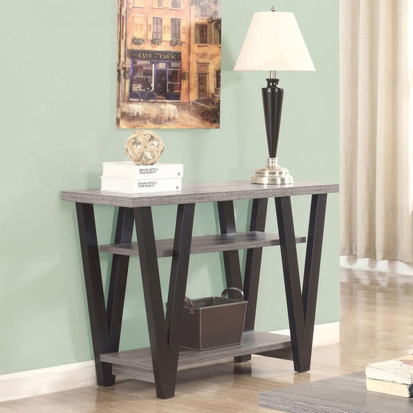  making it a versatile addition to any space. The grey wood-look top and two lower shelves