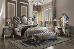 The Versailles collection harmonizes traditional details with functional design to accommodate today-'s styles. This bedroom collection features antique platinum veneers, nailhead trim accents, button tufted headboard/footboard , padded side rails, and ha