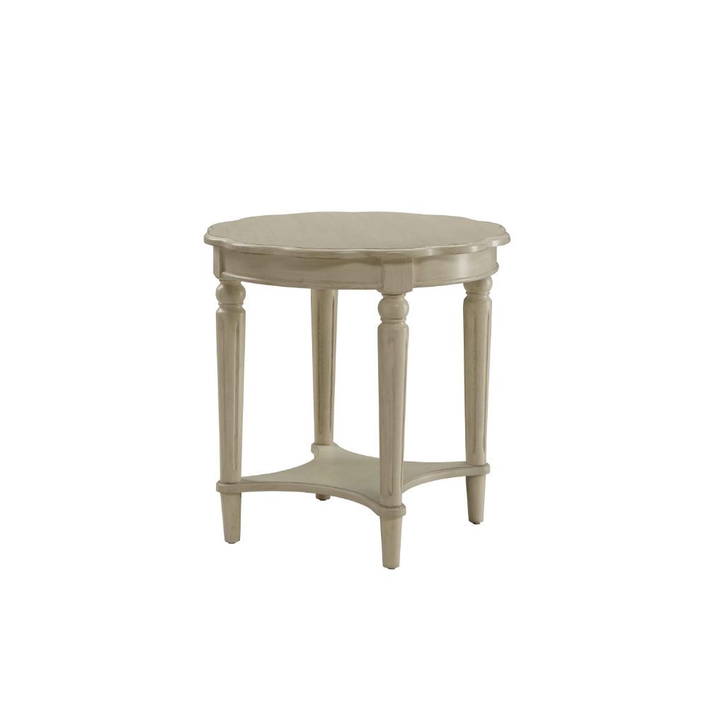 The French country-inspired Fordon occasional table is gracefully designed and made from quality materials. Scalloped round table top, turned legs and a bottom shelf, each piece is carefully crafted while superb functionality is kept in mind. This occasio