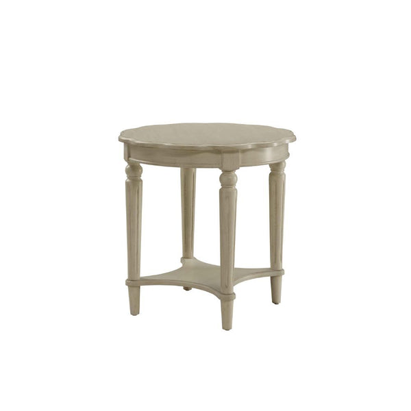 The French country-inspired Fordon occasional table is gracefully designed and made from quality materials. Scalloped round table top, turned legs and a bottom shelf, each piece is carefully crafted while superb functionality is kept in mind. This occasio