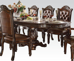 Create an elegant, traditional design in your dining room with the Vendome collection. Hand-crafted piece inspired from the luxurious designs of the past, the Vendome collection features elaborate wood carving details, traditional hardware and a sophistic