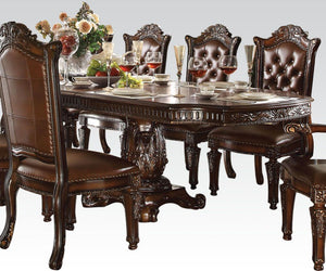 Create an elegant, traditional design in your dining room with the Vendome collection. Hand-crafted piece inspired from the luxurious designs of the past, the Vendome collection features elaborate wood carving details, traditional hardware and a sophistic