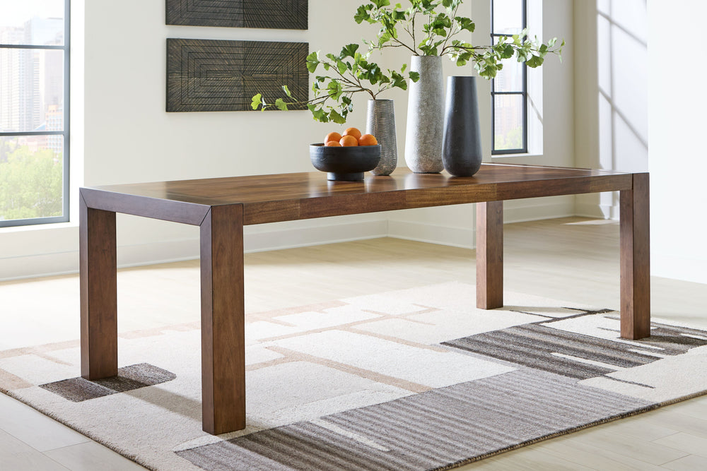 Experience worry-free living with this dining table. Designed to effortlessly blend casual and refined aesthetics, the rich brown butcher block veneer exudes a modern, relaxed vibe you-'ll love. Styled to comfortably seat eight, this piece makes room for 