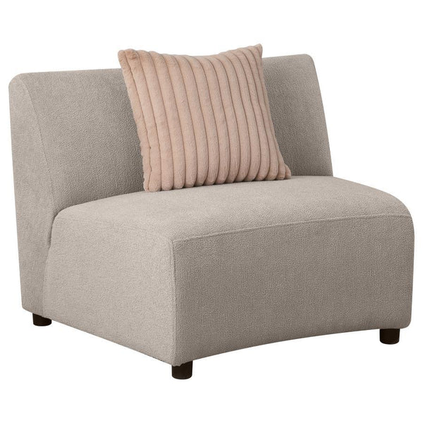 Add length to your sectional or offer a standalone seat with a modern armless chair. Its gently curved silhouette stands out in a sophisticated space, with graceful presence no matter its utilization. The armless chair boasts a wide stance, complete with 