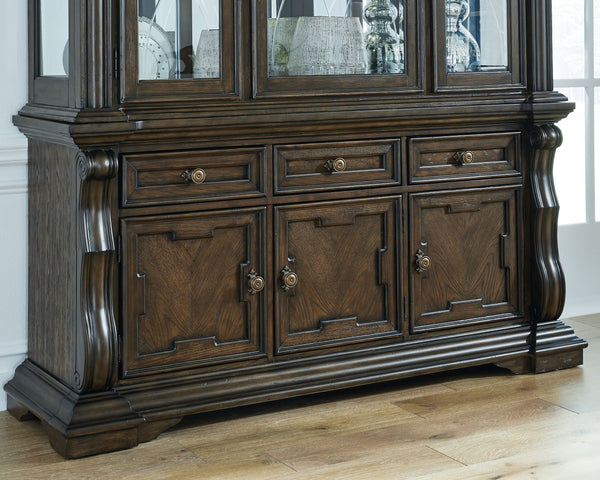  this dining buffet makes a bold statement. With multiple cabinets and drawers to store necessities