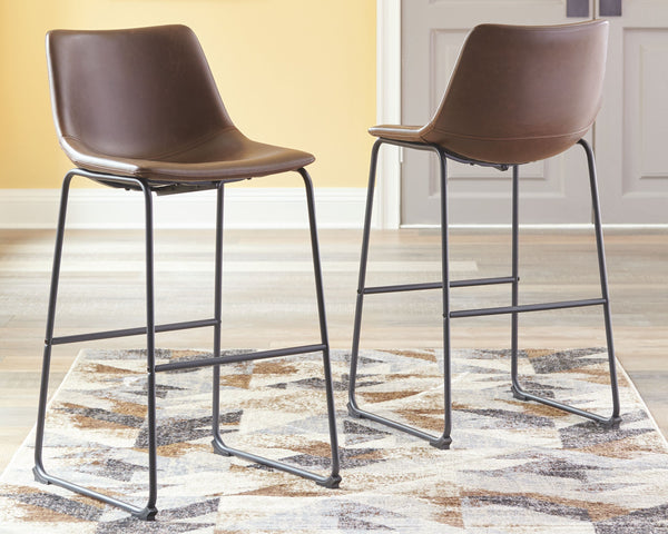  this bar stool serves up a fresh twist on mid-century inspired style. Faux leather upholstery has a charming medium brown tone. What a timeless look for eat-in kitchens and casually cool d