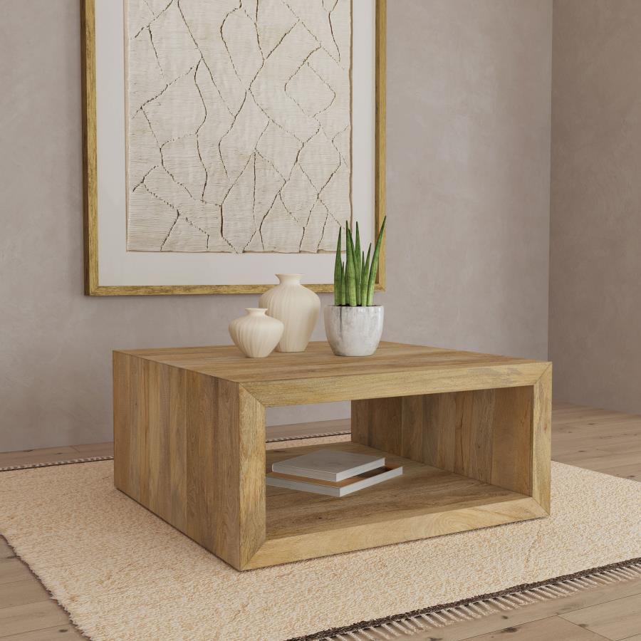 Crafted from solid mango wood, this finely proportioned coffee table invites a timeless, natural charm into your living room. Its 39-inch by 39-inch square profile suits any seating area, while its natural brown finish enhances warmth. This accent coffee 